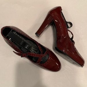 Burgundy patent leather heels. Great details